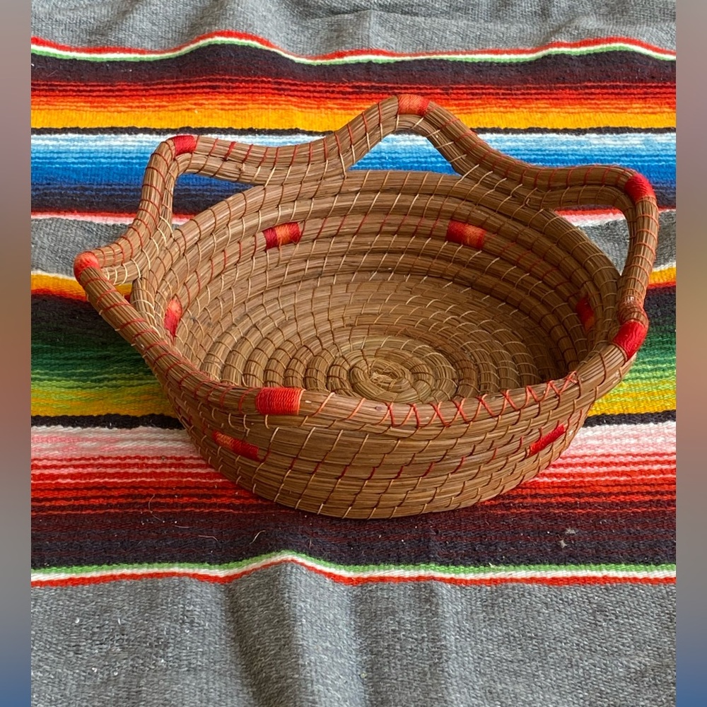 Handwoven Brown Basket with Red Accents